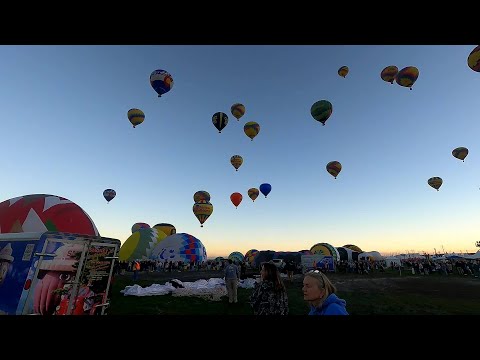 Balloons take off into the sunrise; Day 4 timelapse – YouTube