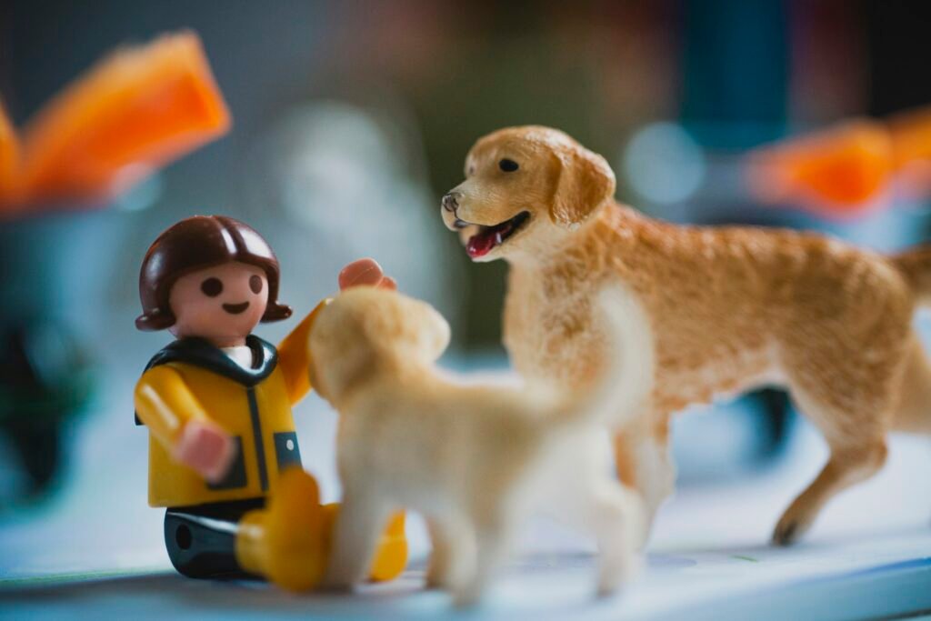 brown dog and yellow dog plastic toys - PuppyStorage.com